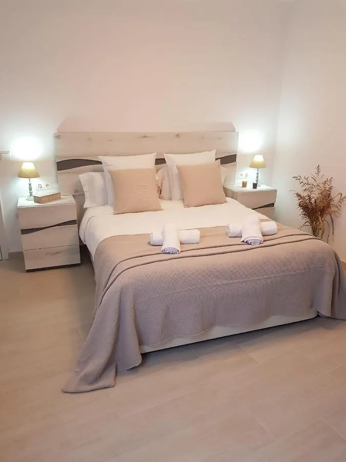 Апартаменты Apartaments L'Arc Палафружель